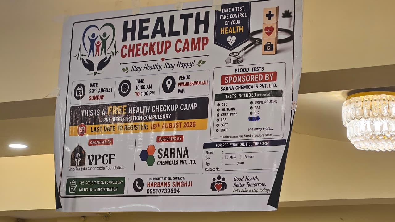 Banner for the free Health Checkup Camp with blood testing at Punjab Bhavan Hall in Vapi